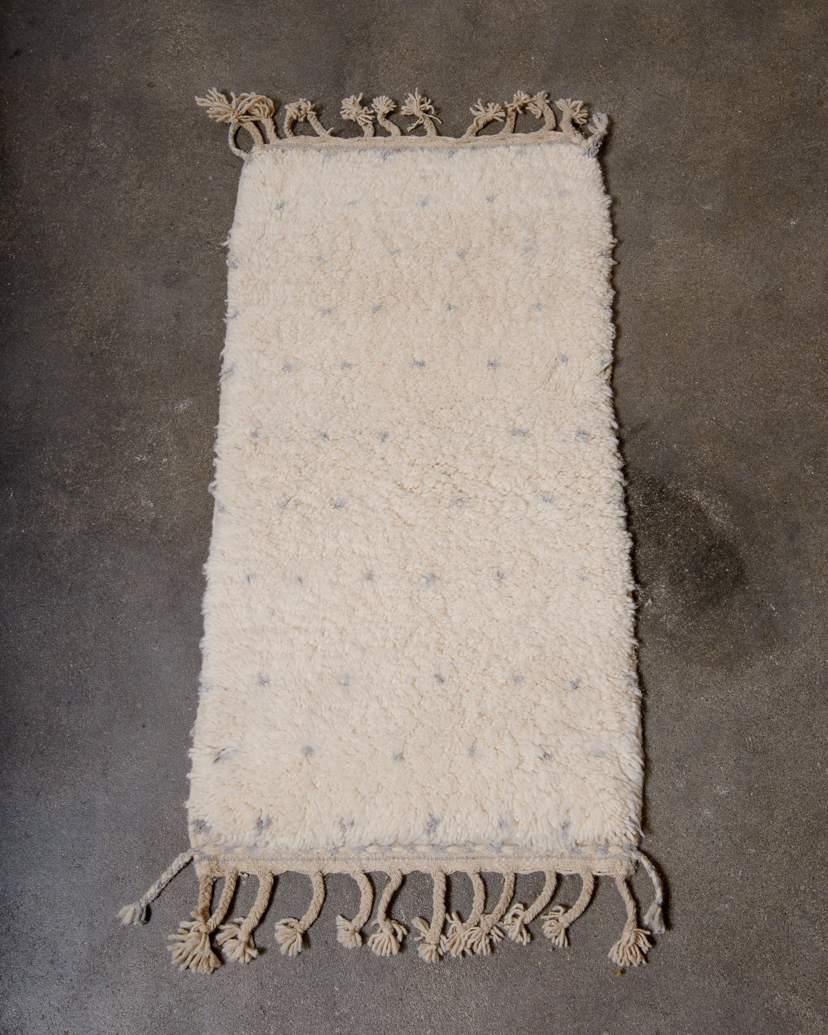Modern, designer, handcrafted Berber rug from Morocco. Beniourain carpet with minimalist design, natural wool pile and a fluffy texture.